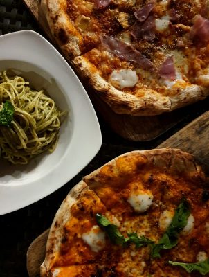 high-angle-view-pizza-served-plate